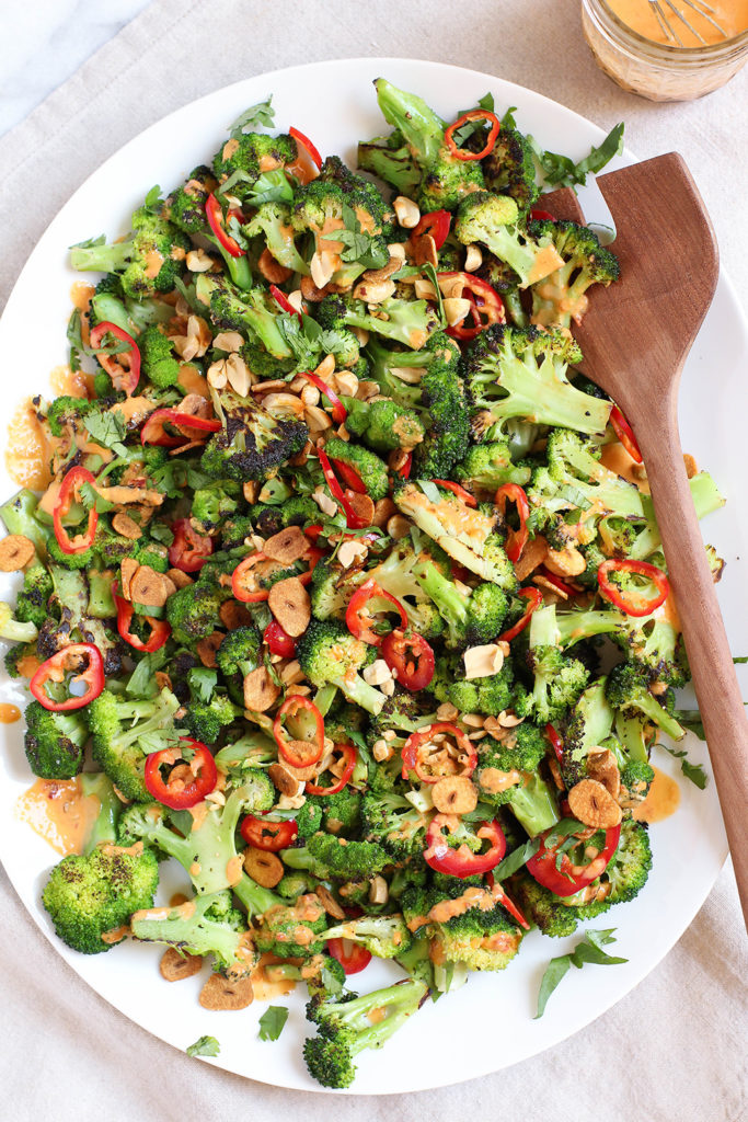 Spicy Broccoli Salad with peanut dressing and crispy garlic chips - vegan & gluten free