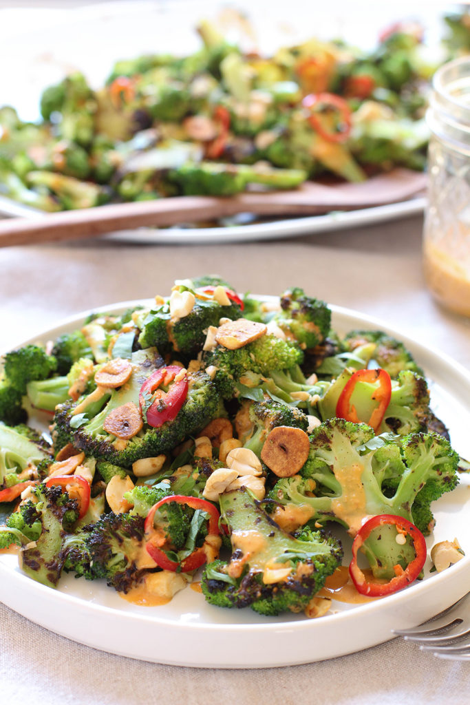 Spicy Broccoli Salad with peanut dressing and crispy garlic chips - vegan & gluten free