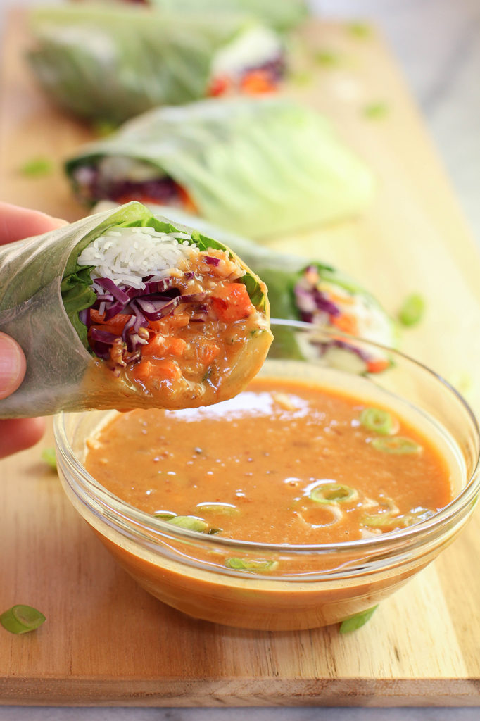 Veggie spring rolls with spicy peanut dipping sauce - vegan & gluten free