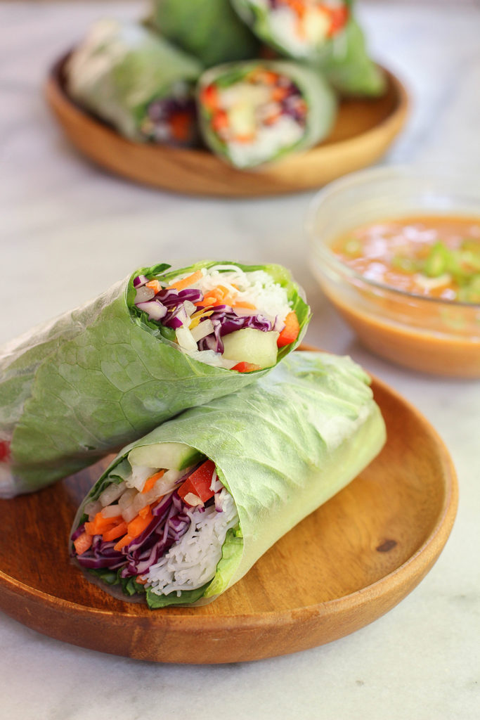 Veggie spring rolls with spicy peanut dipping sauce - vegan & gluten free