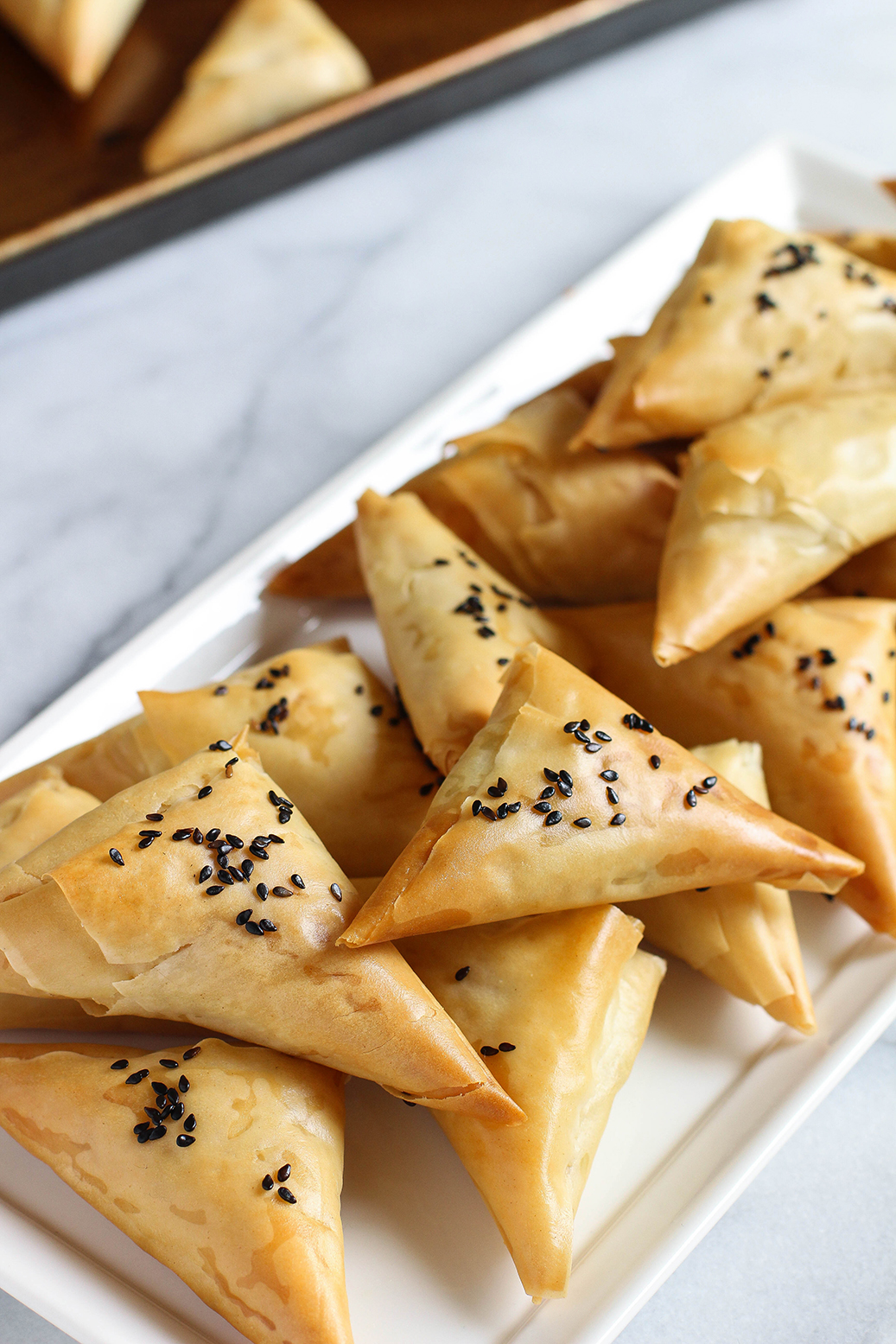 Vegan Spinach & Artichoke Stuffed Spanakopita Triangles